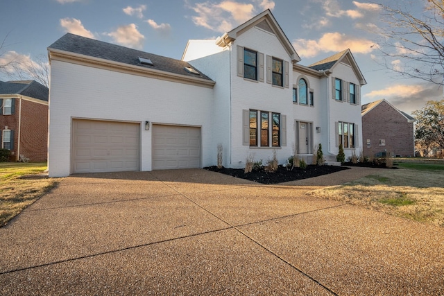 view of front of property with a garage