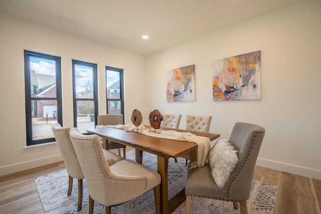 dining room with light hardwood / wood-style flooring