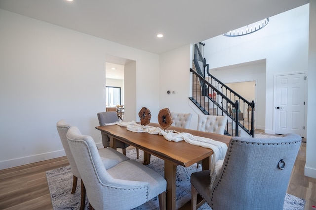 dining area featuring dark hardwood / wood-style floors