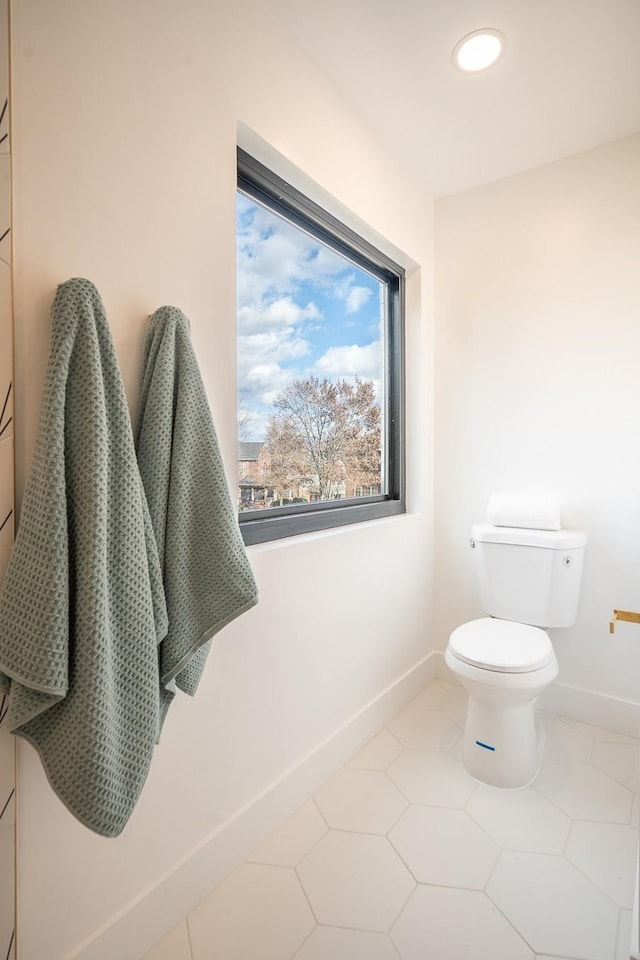 bathroom featuring tile patterned floors and toilet