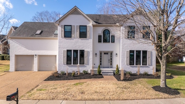 view of front of home with a garage