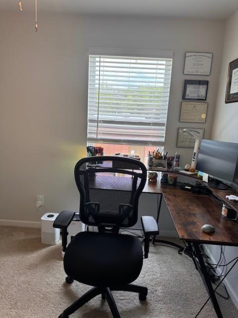 view of carpeted office space