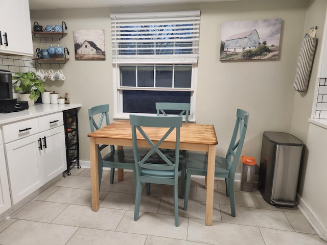 dining room with light tile patterned floors