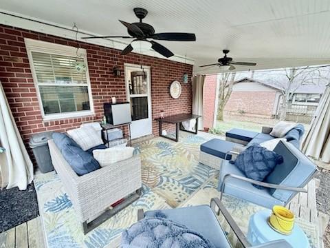 view of patio / terrace featuring an outdoor hangout area and ceiling fan