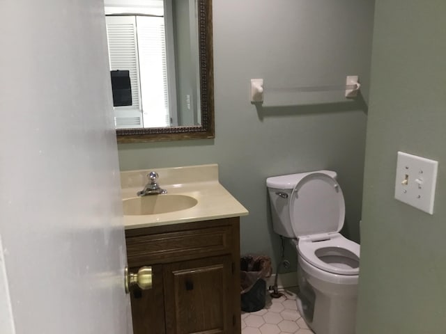 bathroom with vanity and toilet