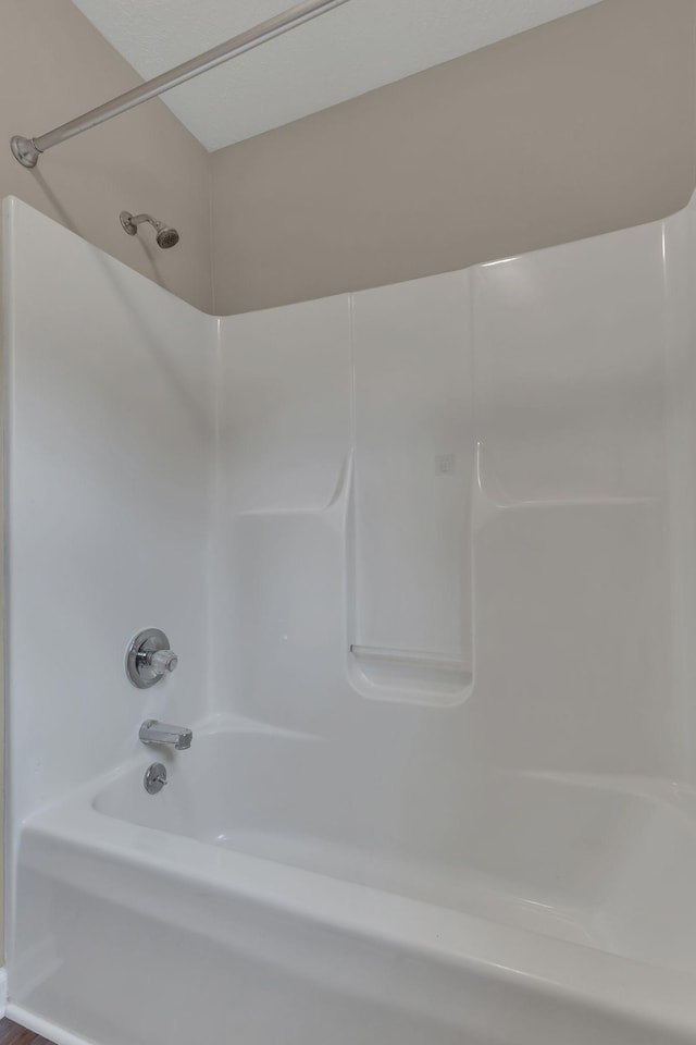 bathroom with shower / bath combination