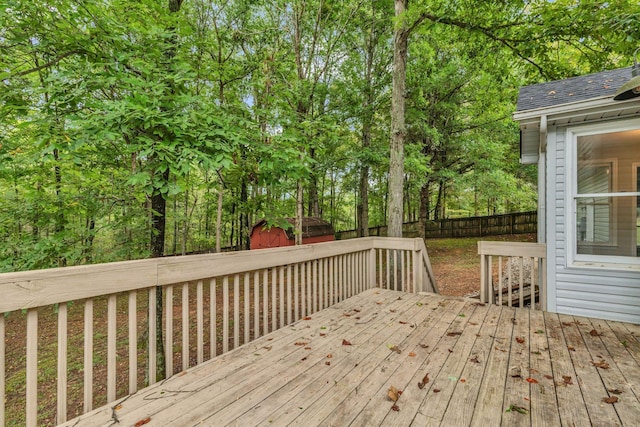 wooden deck with a storage unit