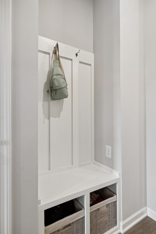 mudroom featuring dark wood-type flooring