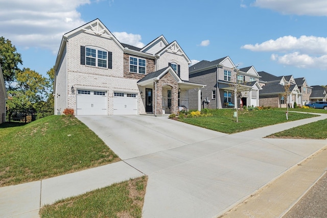 view of front of home with a garage and a front lawn