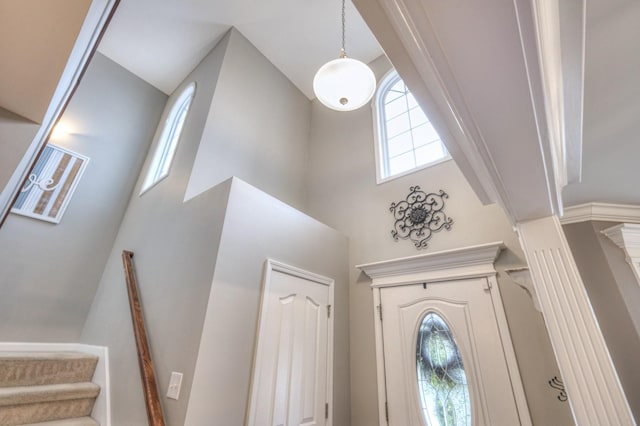 entryway with a high ceiling