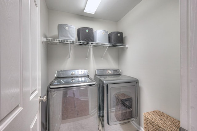 washroom with washer and clothes dryer