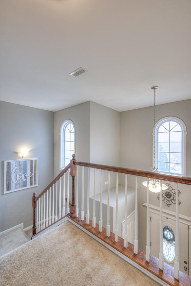 corridor featuring carpet flooring