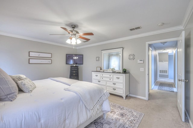 bedroom featuring ornamental molding, light colored carpet, and ceiling fan