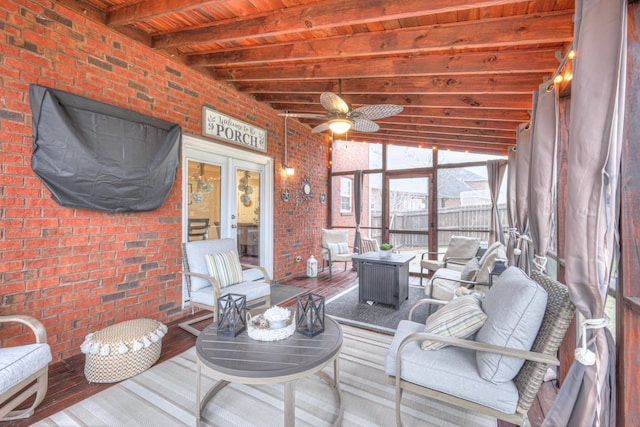 sunroom with french doors, ceiling fan, beam ceiling, and wooden ceiling