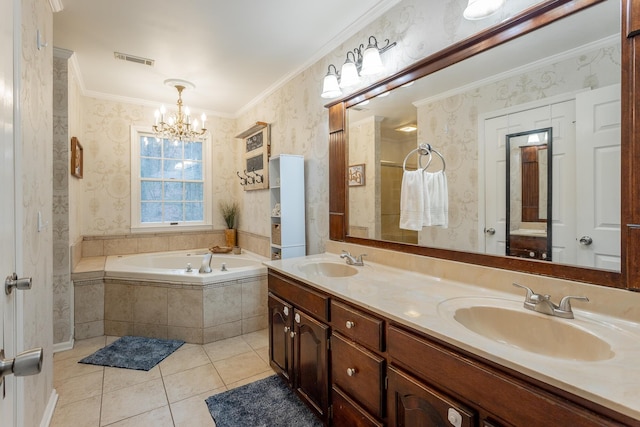 bathroom featuring a chandelier, ornamental molding, vanity, a relaxing tiled tub, and tile patterned flooring