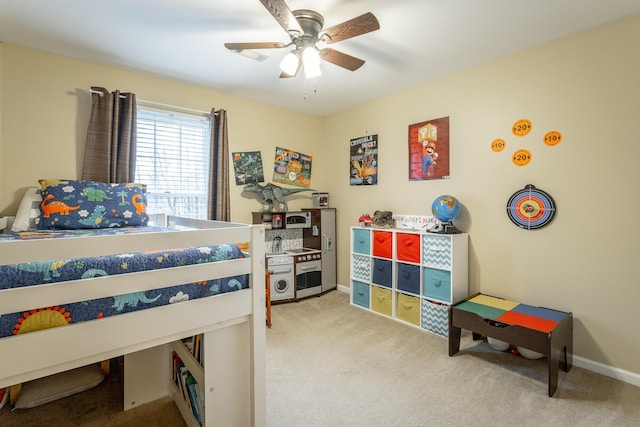 carpeted bedroom with ceiling fan