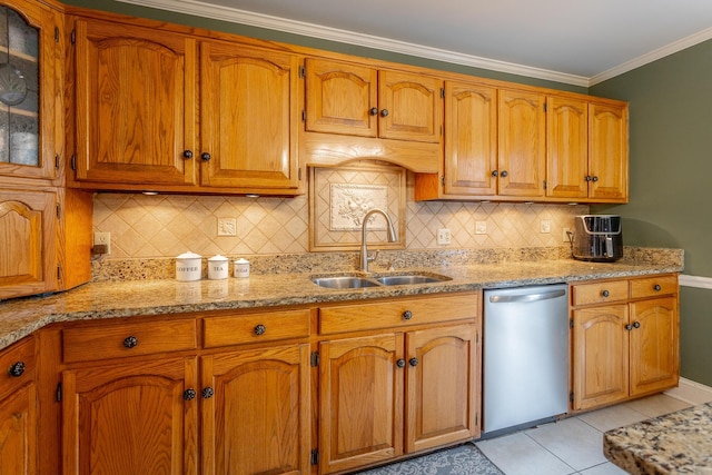 kitchen with sink, crown molding, light tile patterned floors, stainless steel dishwasher, and light stone countertops