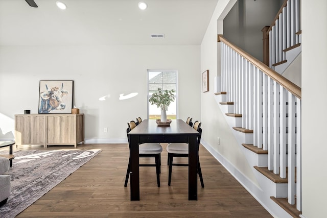 dining area featuring dark hardwood / wood-style flooring