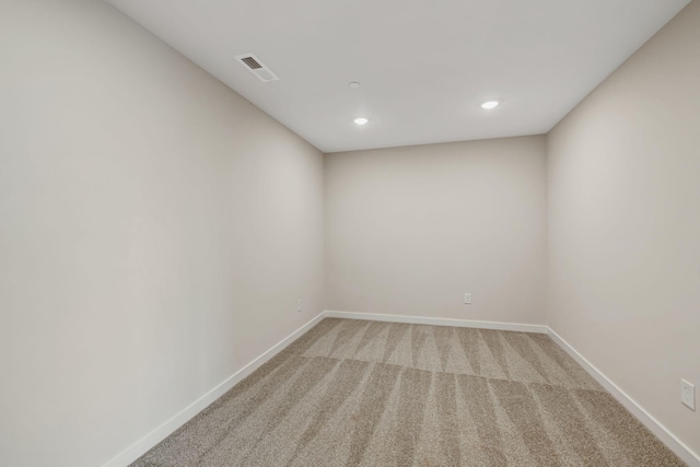 unfurnished room featuring carpet flooring