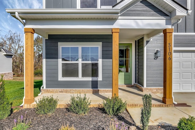 property entrance with a garage