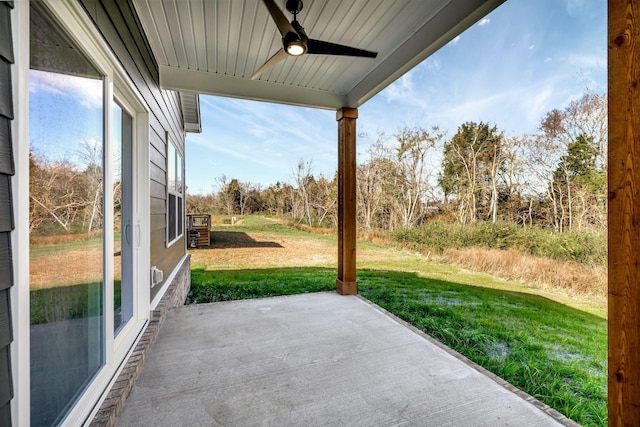 view of patio featuring ceiling fan