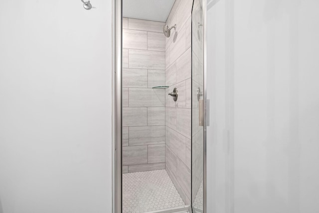 bathroom featuring an enclosed shower