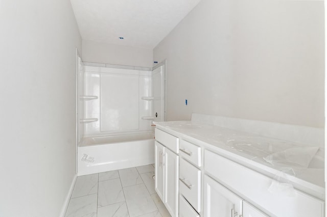 bathroom with vanity and  shower combination