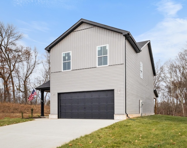 view of property exterior with a yard and a garage