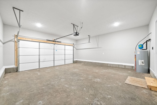 garage featuring water heater and a garage door opener