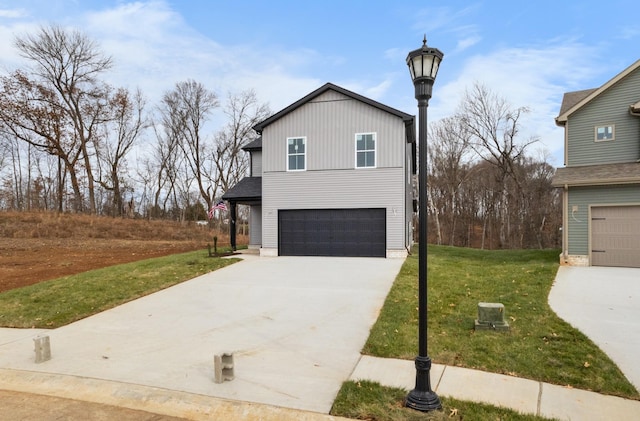 view of front facade with a garage and a front lawn