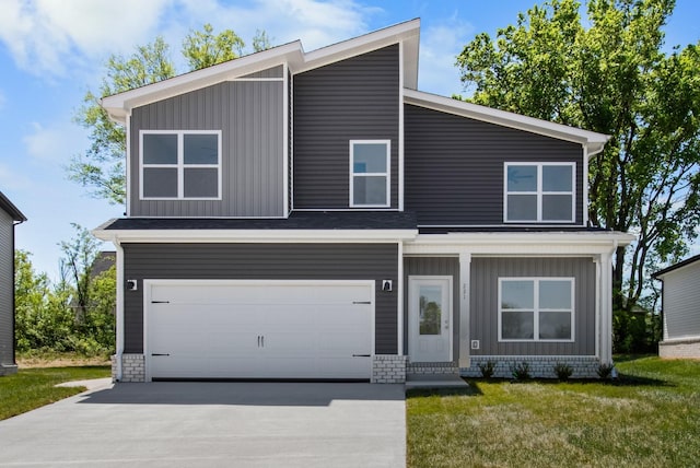 modern home featuring a garage and a front yard