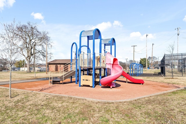 view of jungle gym with a lawn