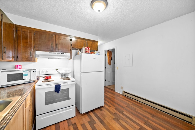 kitchen with dark hardwood / wood-style flooring, a baseboard heating unit, a textured ceiling, and white appliances