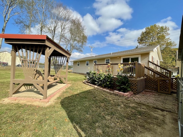 view of yard featuring a deck