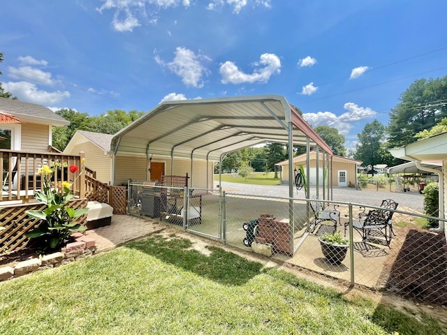 exterior space with a carport and a lawn