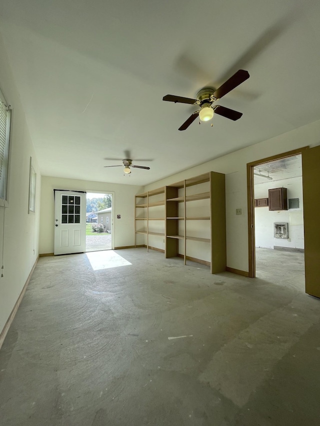 unfurnished living room with heating unit