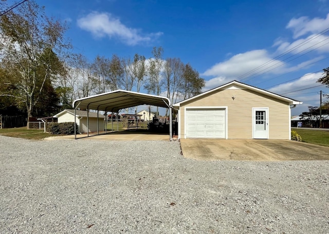 garage featuring a carport