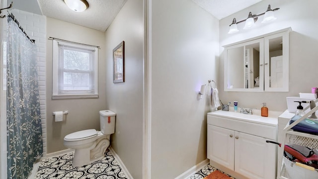 bathroom featuring a shower with shower curtain, vanity, a textured ceiling, tile patterned floors, and toilet