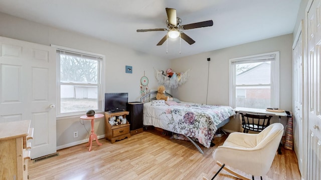 bedroom featuring ceiling fan and light hardwood / wood-style floors