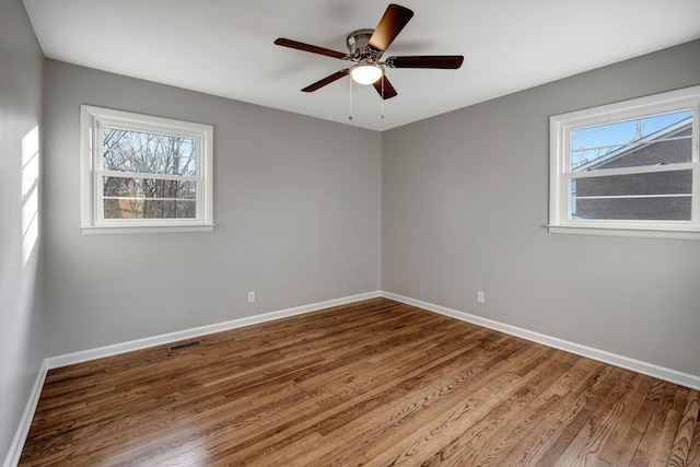 604 W 4th Ave, Hohenwald, TN 38462 - unfurnished room featuring wood-type flooring and ceiling fan