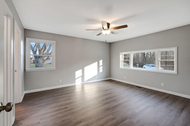 604 W 4th Ave, Hohenwald, TN 38462 - empty room featuring dark wood-type flooring and ceiling fan