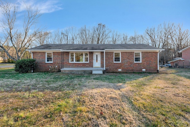 ranch-style house with a front yard