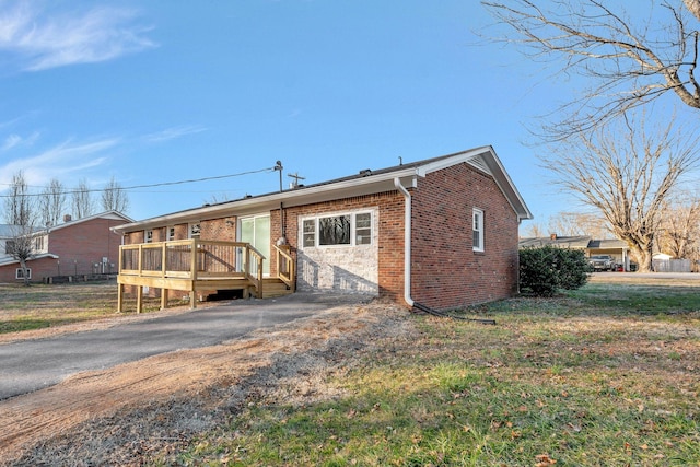 604 W 4th Ave, Hohenwald, TN 38462 - view of front of house featuring a wooden deck
