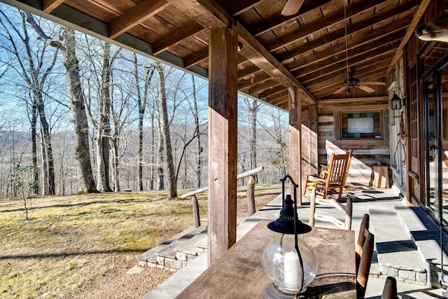 view of patio featuring ceiling fan