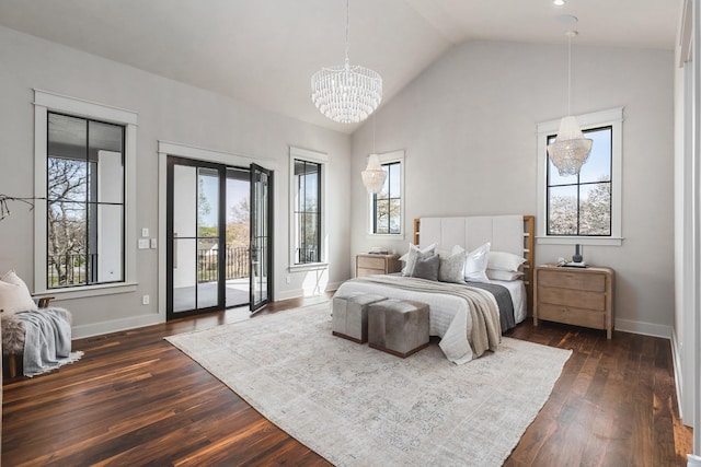 bedroom with lofted ceiling, dark wood-type flooring, access to exterior, and a chandelier