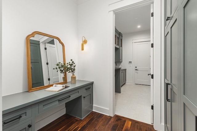 bathroom with vanity and hardwood / wood-style floors