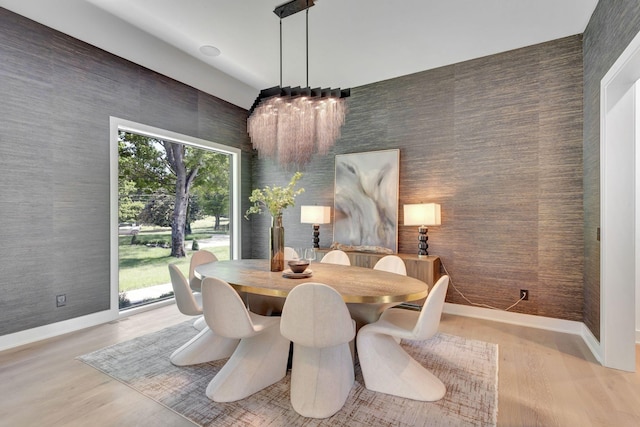 dining area with light hardwood / wood-style floors