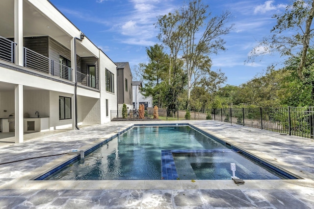 view of pool with a patio