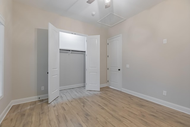 unfurnished bedroom featuring a closet, ceiling fan, and light hardwood / wood-style flooring