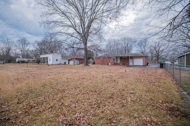 view of yard with a garage